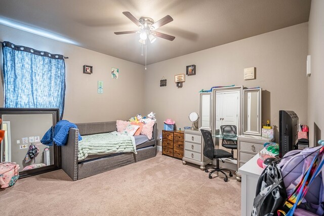 6108 Copper Sky Ct, Midland, TX 79705 - carpeted bedroom featuring a desk and ceiling fan