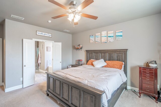 6108 Copper Sky Ct, Midland, TX 79705 - bedroom featuring light colored carpet, baseboards, ceiling fan, and ensuite bath