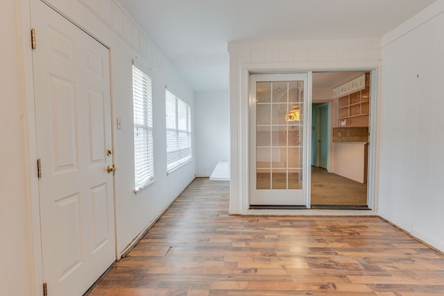 foyer entrance with hardwood / wood-style floors