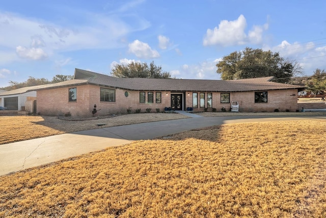 ranch-style home with brick siding