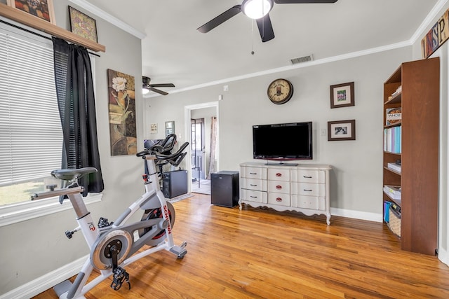 1400 W Tennessee Ave, Midland, TX 79701 - workout area featuring a ceiling fan, ornamental molding, light wood-type flooring, and baseboards