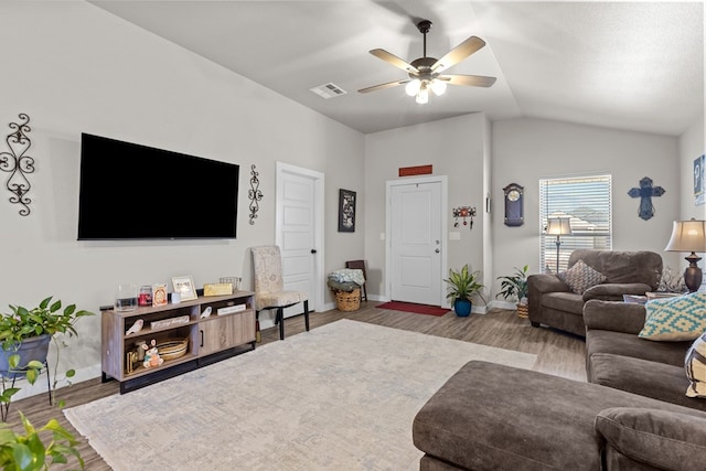 1201 Bajada St, Midland, TX 79705 - living room with wood finished floors, baseboards, a ceiling fan, and vaulted ceiling