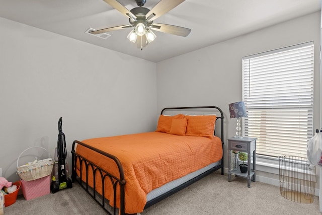 1201 Bajada St, Midland, TX 79705 - carpeted bedroom with a ceiling fan