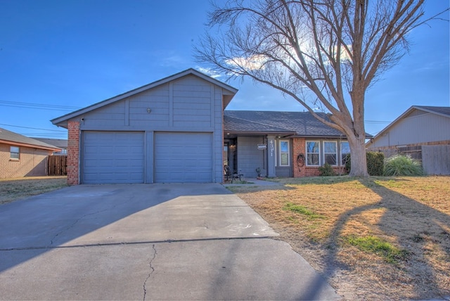 ranch-style house featuring a garage