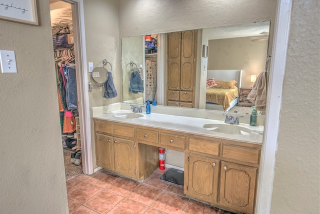 bathroom featuring vanity and tile patterned floors