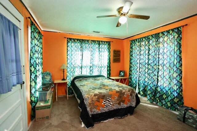 7501 N County Rd 29, Big Spring, TX 79720 - carpeted bedroom featuring ceiling fan