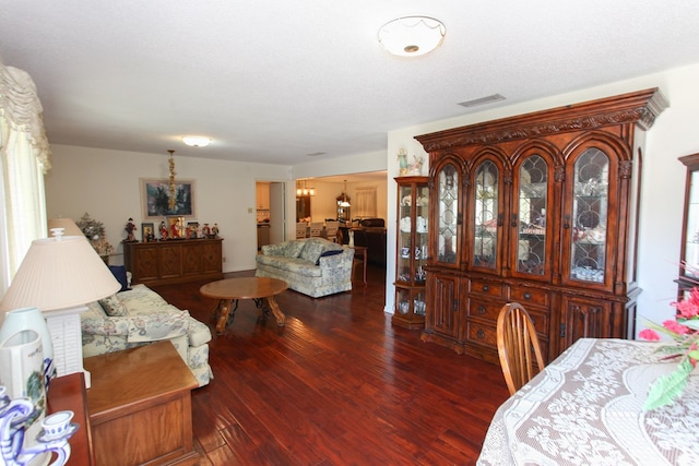 dining room with visible vents and wood finished floors