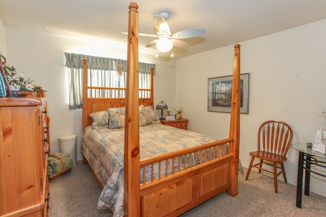 carpeted bedroom featuring a ceiling fan
