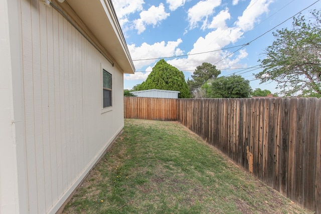 view of yard featuring a fenced backyard