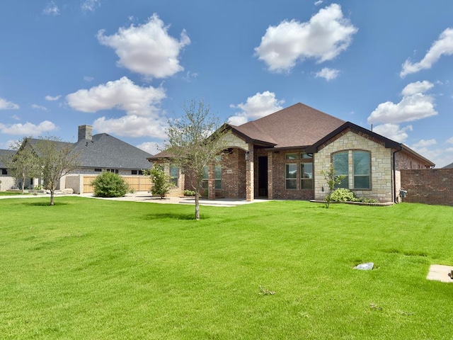 5516 E County Rd 93, Midland, TX 79706 - french country home featuring stone siding