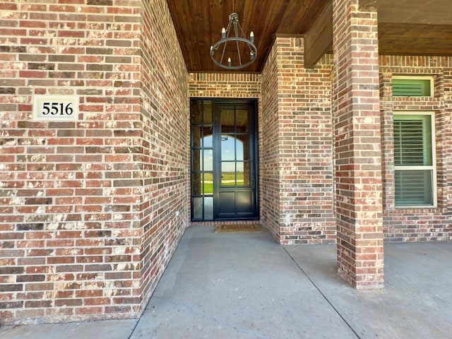 5516 E County Rd 93, Midland, TX 79706 - doorway to property with brick siding