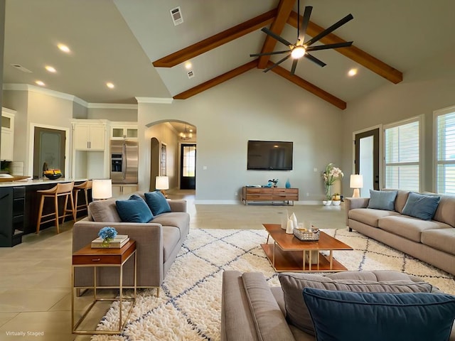 5516 E County Rd 93, Midland, TX 79706 - living room with arched walkways, ceiling fan, high vaulted ceiling, beamed ceiling, and recessed lighting