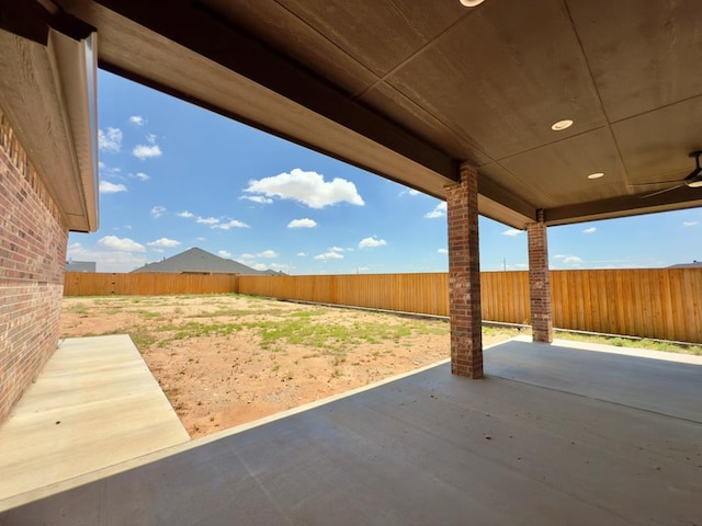 5516 E County Rd 93, Midland, TX 79706 - fenced backyard featuring a patio