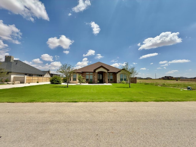 5516 E County Rd 93, Midland, TX 79706 - view of front of house featuring a front lawn