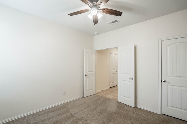 4906 Meadowside St, Midland, TX 79705 - unfurnished bedroom featuring light carpet and a ceiling fan