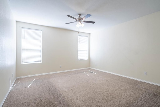 4906 Meadowside St, Midland, TX 79705 - carpeted spare room featuring ceiling fan and baseboards