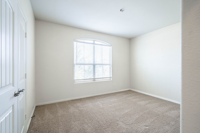 4906 Meadowside St, Midland, TX 79705 - spare room featuring carpet and baseboards