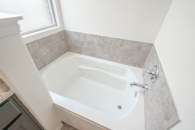 4906 Meadowside St, Midland, TX 79705 - bathroom with a bath and vanity