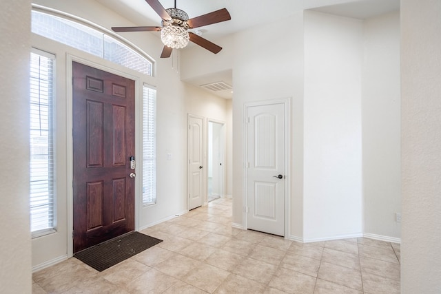 4906 Meadowside St, Midland, TX 79705 - tiled foyer entrance featuring ceiling fan and high vaulted ceiling