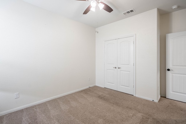 4906 Meadowside St, Midland, TX 79705 - unfurnished bedroom featuring light colored carpet, a closet, and ceiling fan