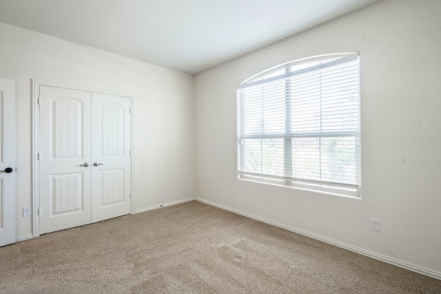 4906 Meadowside St, Midland, TX 79705 - unfurnished bedroom featuring carpet and a closet