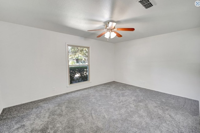 2 Auburn Ct, Midland, TX 79705 - spare room with carpet floors, a ceiling fan, and visible vents