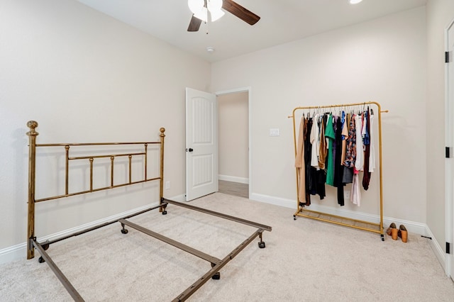 4506 San Pedro Ct, Midland, TX 79707 - carpeted bedroom with baseboards and a ceiling fan