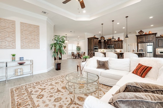 4506 San Pedro Ct, Midland, TX 79707 - living area featuring ceiling fan, visible vents, crown molding, light wood-style floors, and recessed lighting