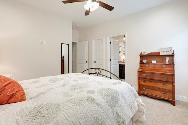 4506 San Pedro Ct, Midland, TX 79707 - bedroom featuring a ceiling fan, baseboards, light colored carpet, and ensuite bath