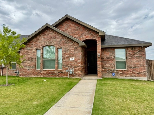 37 Devon Ct, Odessa, TX 79765 - ranch-style house with brick siding and a shingled roof