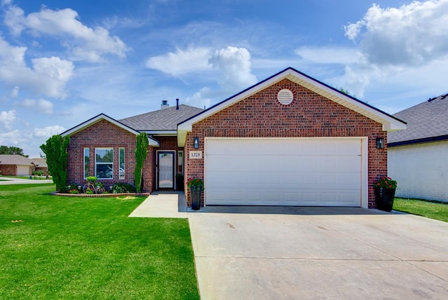 1328 E Dormard Ave, Midland, TX 79705 - ranch-style house with brick siding, driveway, a front yard, and an attached garage