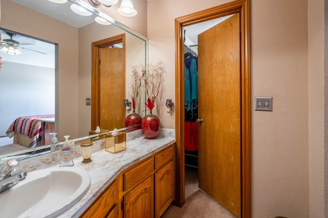 bathroom featuring vanity and a ceiling fan