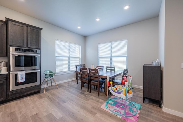 6803 Leather Ln, Midland, TX 79705 - dining space featuring baseboards, light wood-type flooring, and recessed lighting