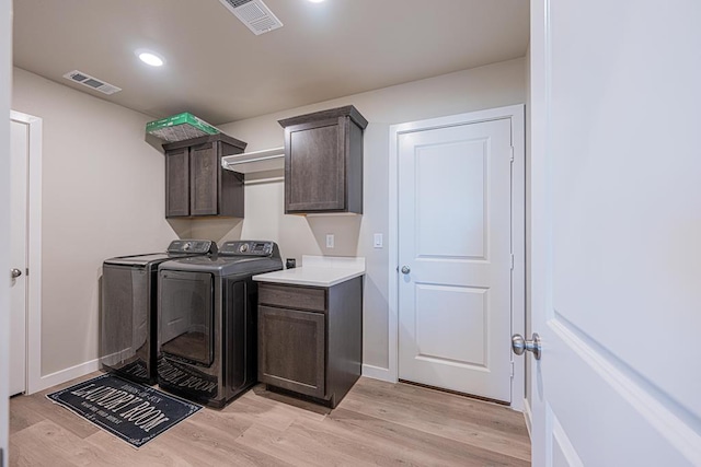6803 Leather Ln, Midland, TX 79705 - clothes washing area with cabinet space, separate washer and dryer, light wood-style floors, baseboards, and recessed lighting