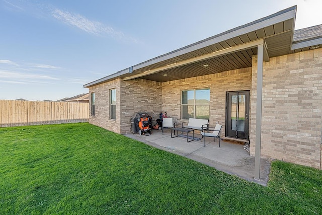 6803 Leather Ln, Midland, TX 79705 - rear view of property featuring a patio area and brick siding