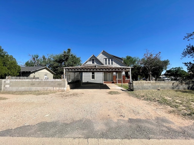 view of front of house with a carport