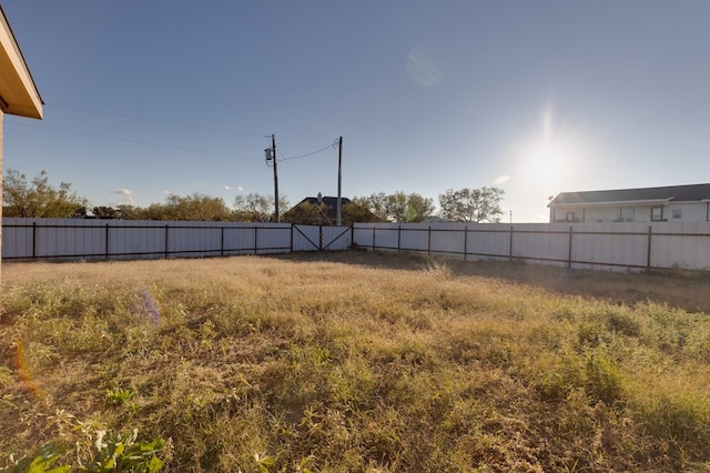 view of yard with fence