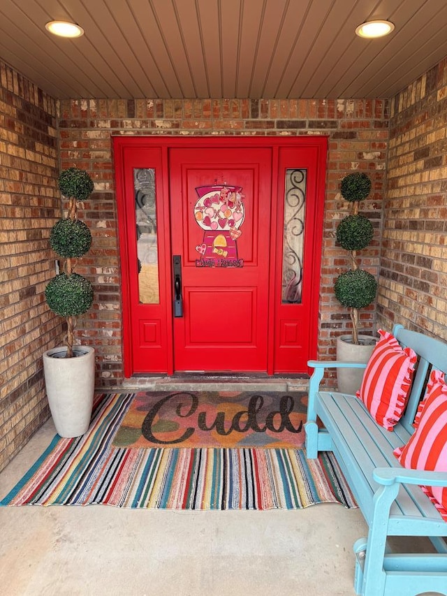 doorway to property featuring covered porch