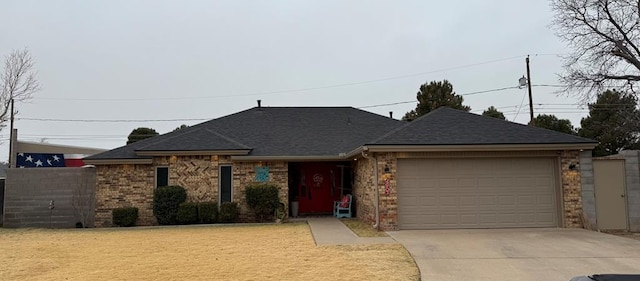 single story home with a garage