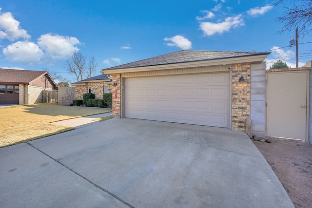 garage with fence