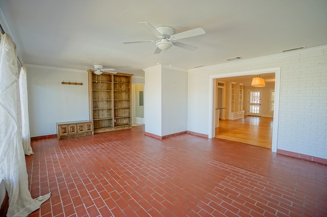 unfurnished room featuring ceiling fan and crown molding