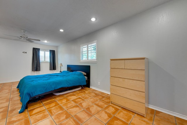 2603 Hughes St, Midland, TX 79705 - bedroom featuring recessed lighting, light tile patterned floors, and ceiling fan