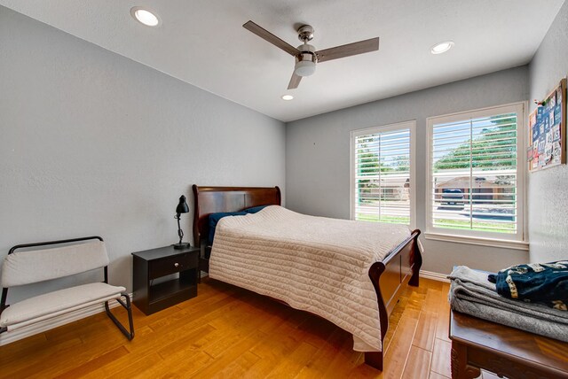 2603 Hughes St, Midland, TX 79705 - bedroom featuring light wood finished floors, a ceiling fan, recessed lighting, and a textured wall