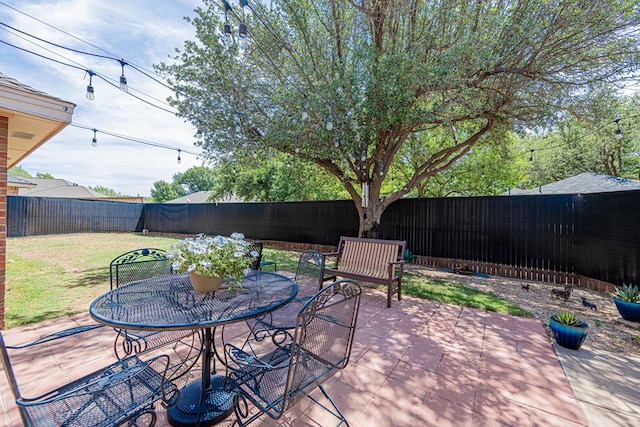 view of patio featuring outdoor dining space