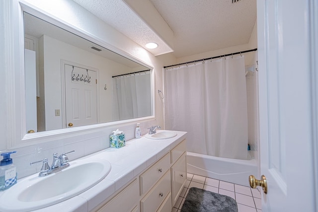 bathroom with tile patterned flooring, double vanity, shower / bath combo, decorative backsplash, and a textured ceiling