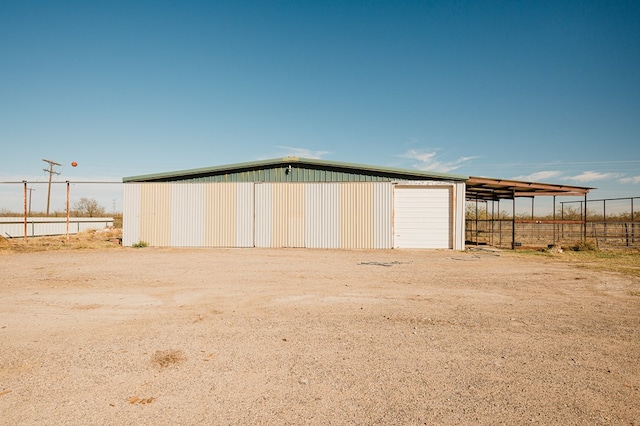 garage with a carport