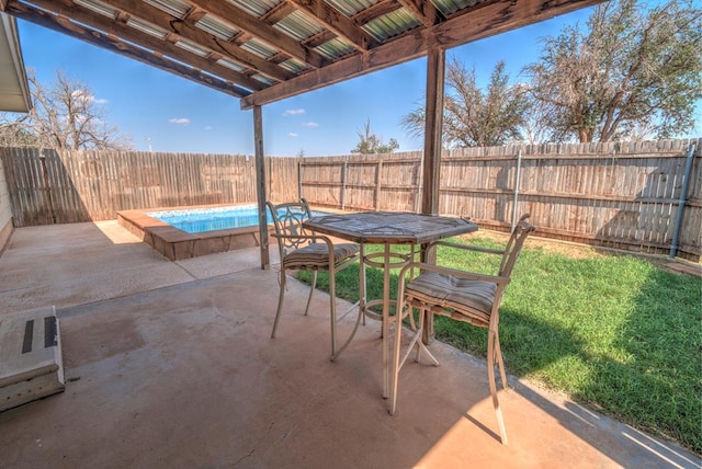 4606 N County Rd 1135, Midland, TX 79705 - fenced backyard with a patio