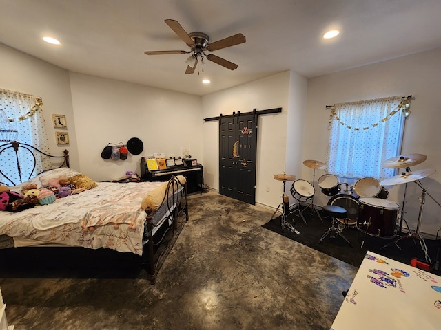 24501 S County Rd 1210, Midland, TX 79706 - bedroom featuring a barn door, unfinished concrete flooring, recessed lighting, and a ceiling fan