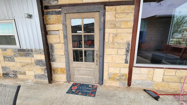 24501 S County Rd 1210, Midland, TX 79706 - doorway to property with stone siding