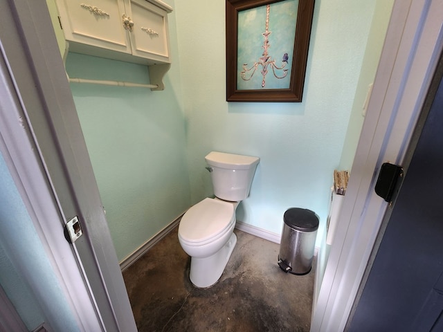 24501 S County Rd 1210, Midland, TX 79706 - bathroom featuring toilet and concrete flooring